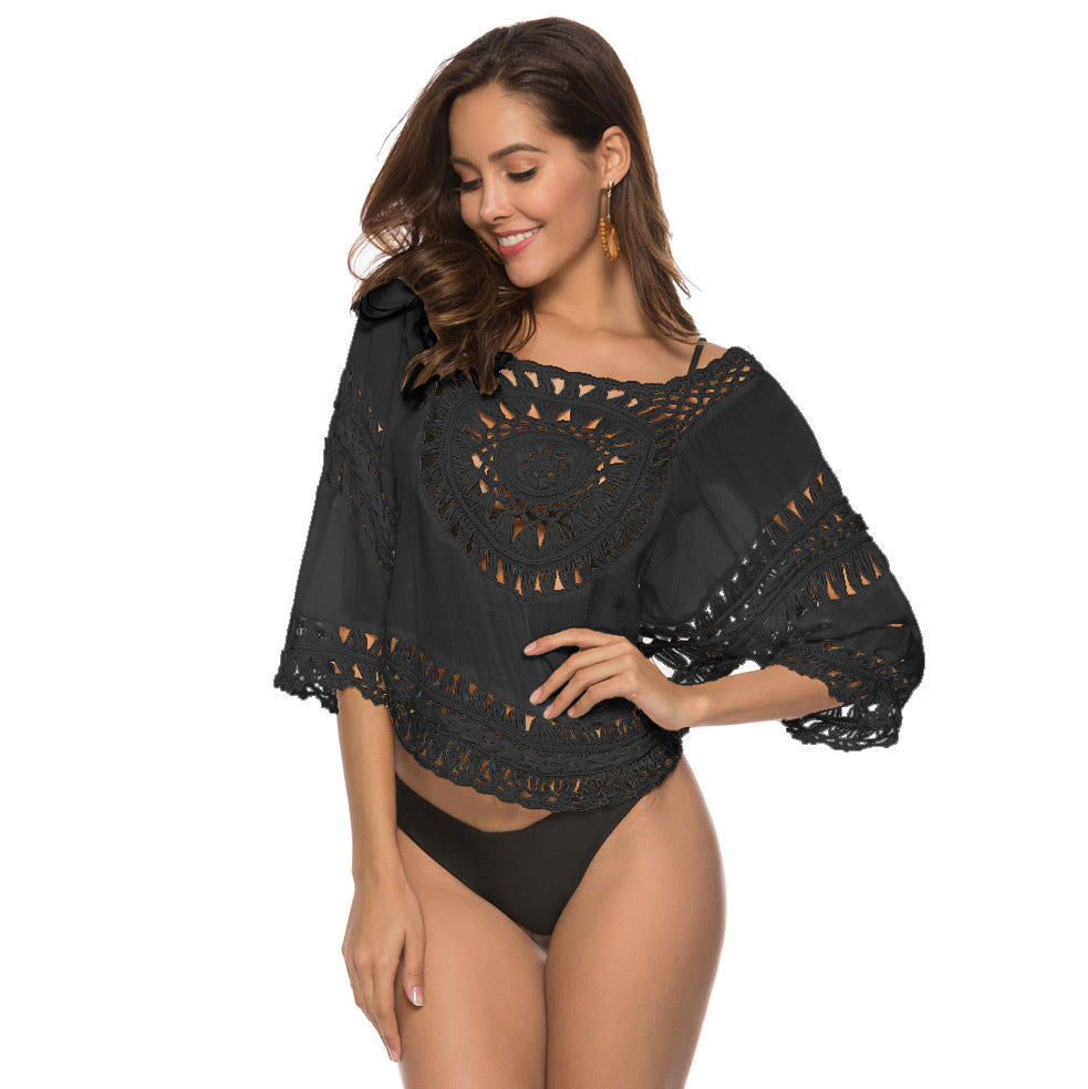Women's crochet wrap with asymmetric cut and fringes