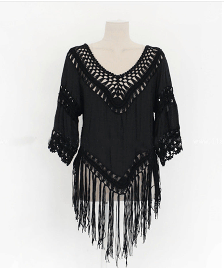 Women's crochet beach tunic with fringe decorations and elegant V-neck