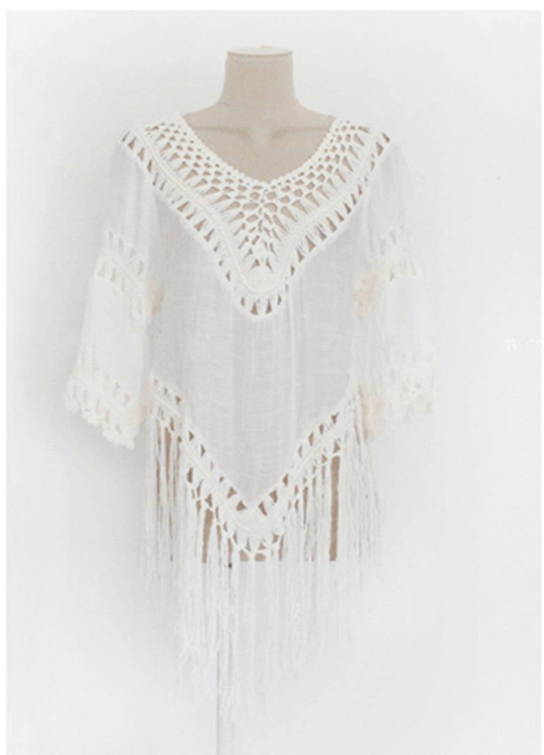 Women's crochet beach tunic with fringe decorations and elegant V-neck