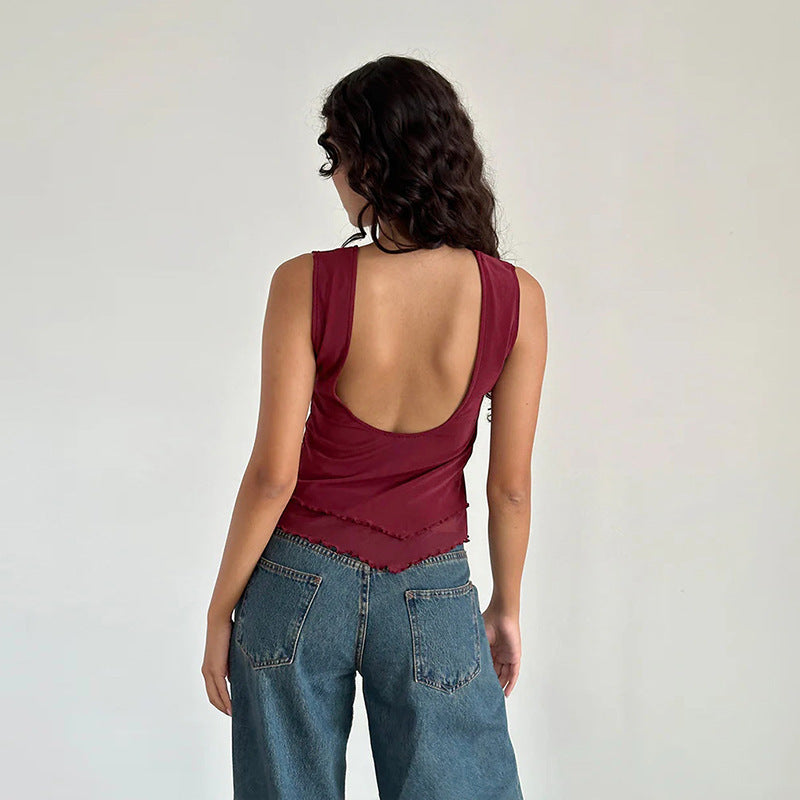 Women's sleeveless top with elegant transparent hem and figure-shaping cut W&W