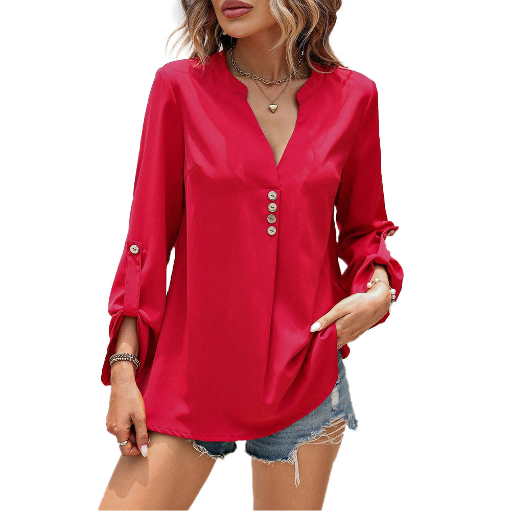 Women's blouse with elegant V-neck and sophisticated button details W&W