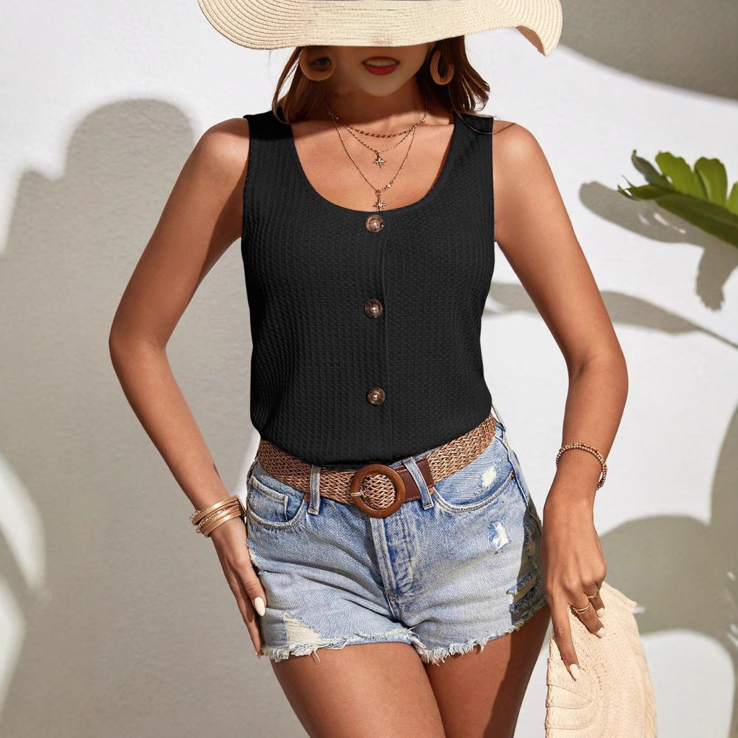Women's sleeveless top with decorative buttons and textured fabric WW