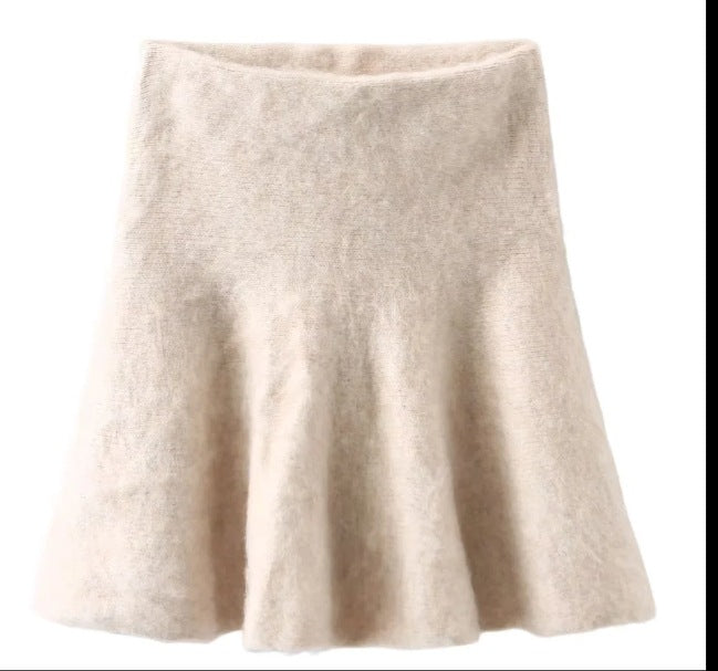 Women's knitted dress with half-length sleeves and decorative buttons