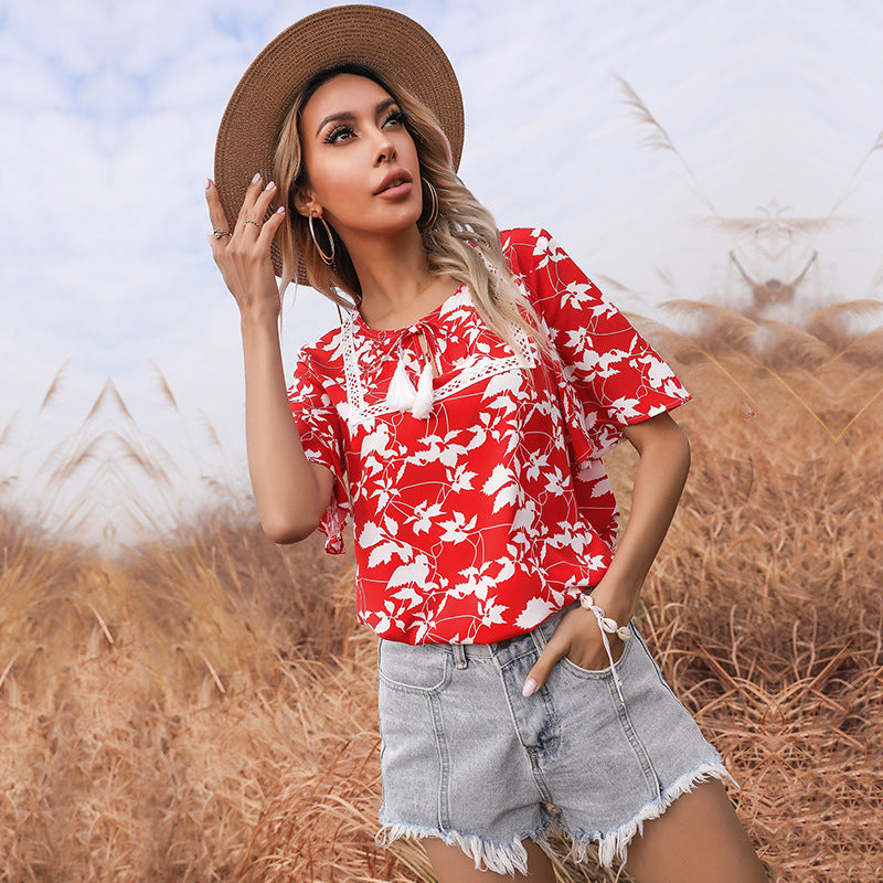 Women's floral design top with voluminous sleeves and elegant V-neck WW