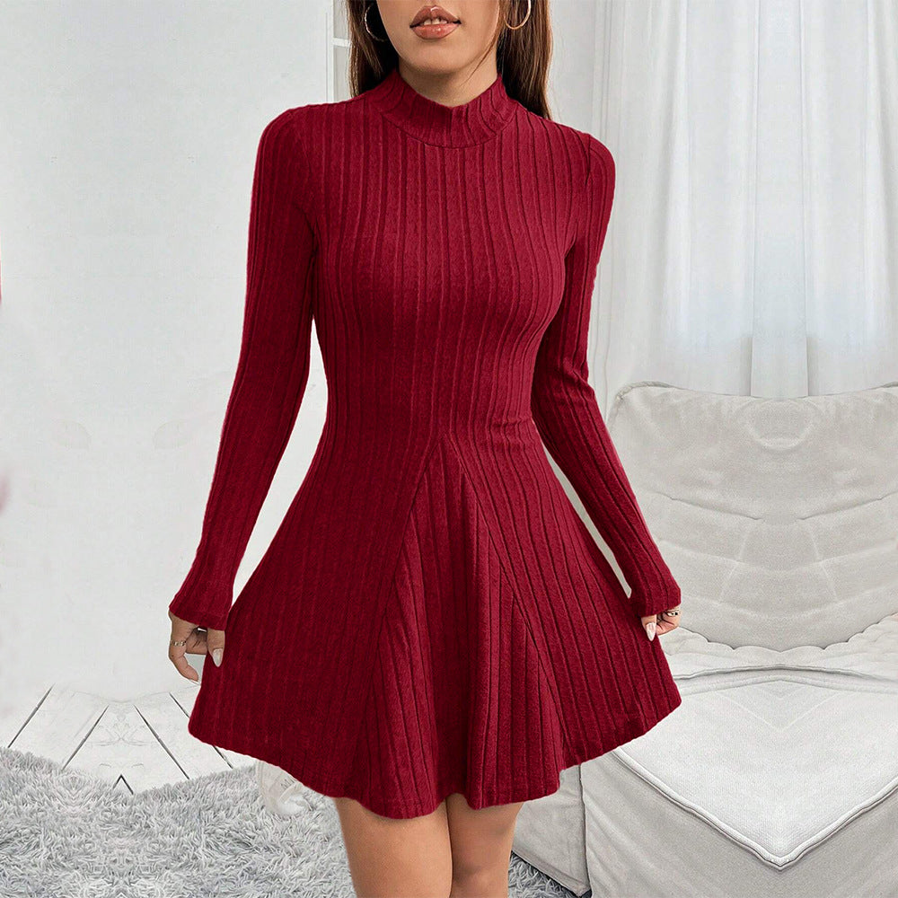 Women's knitted dress with high collar and flared hem
