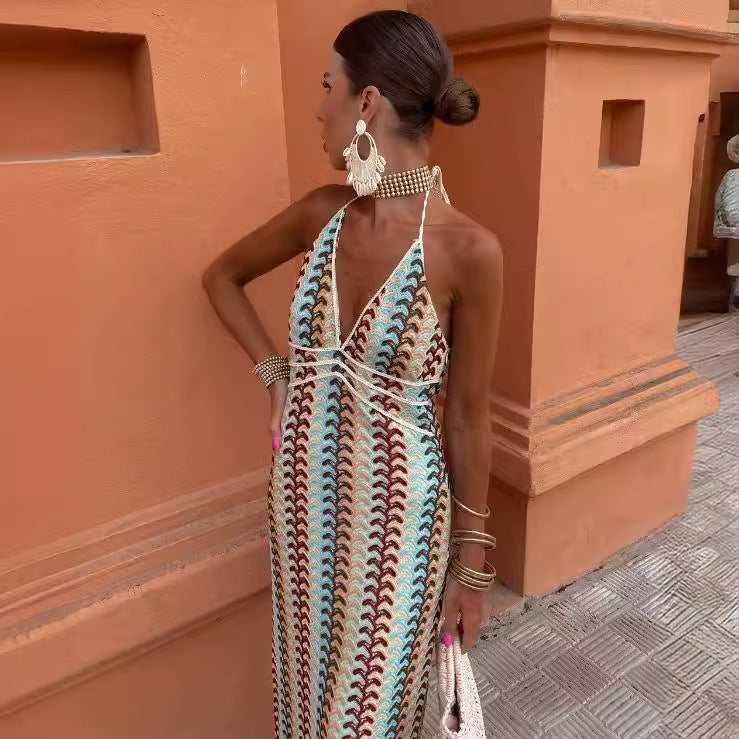 Women's knitted dress with deep V-neck and sophisticated wave pattern