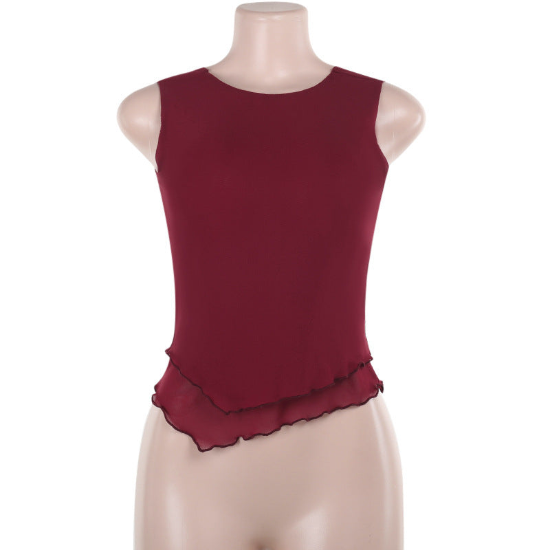 Women's sleeveless top with elegant transparent hem and figure-shaping cut W&W