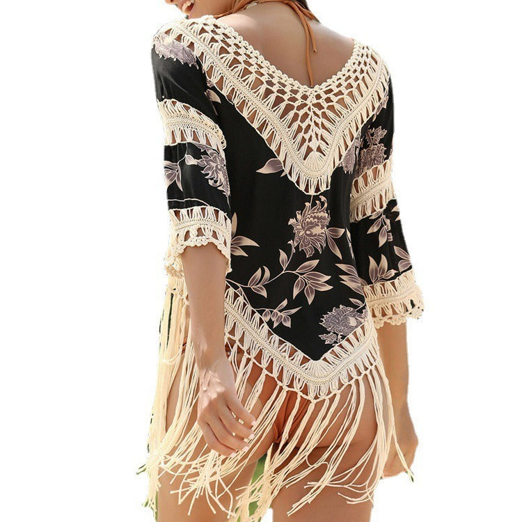 Women's crochet beach poncho with frayed accents and floral design