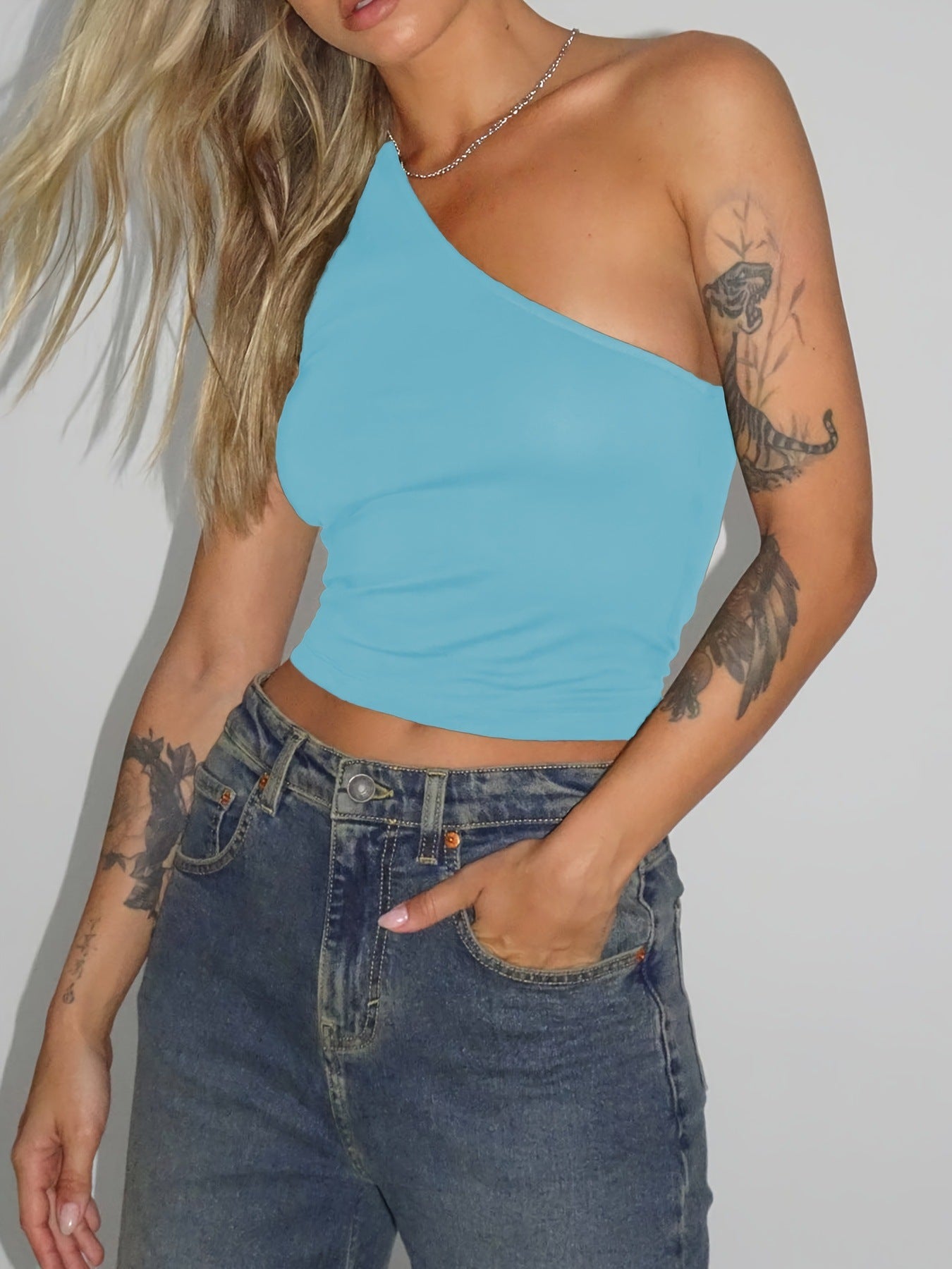Women's asymmetric crop top made of stretch fabric with a slim fit WW