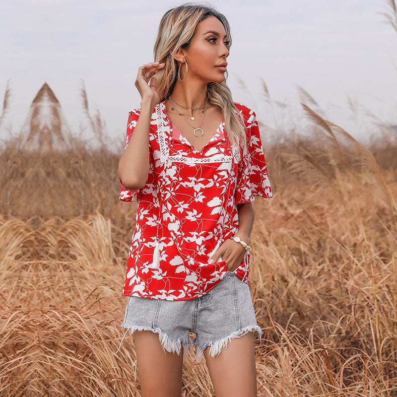 Women's floral design top with voluminous sleeves and elegant V-neck WW