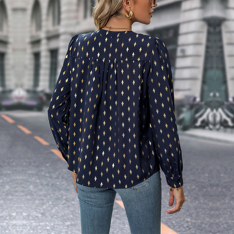 Women's blouse with elegant puff sleeves and graphic pattern WW