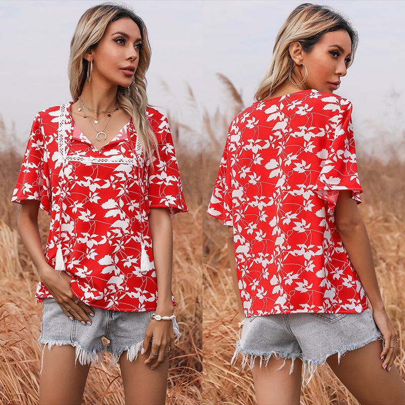 Women's floral design top with voluminous sleeves and elegant V-neck WW