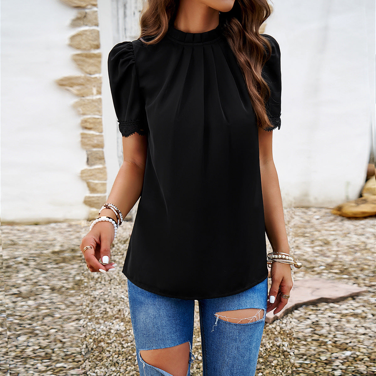 Women's blouse with elegant ruffles and subtle pleats WW
