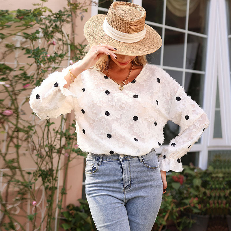 Women's blouse with decorative ruffle details and feminine lace structure WW