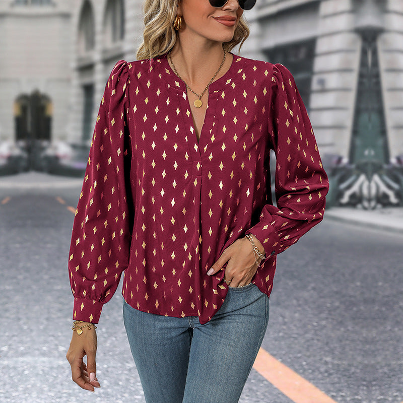 Women's blouse with elegant puff sleeves and graphic pattern WW