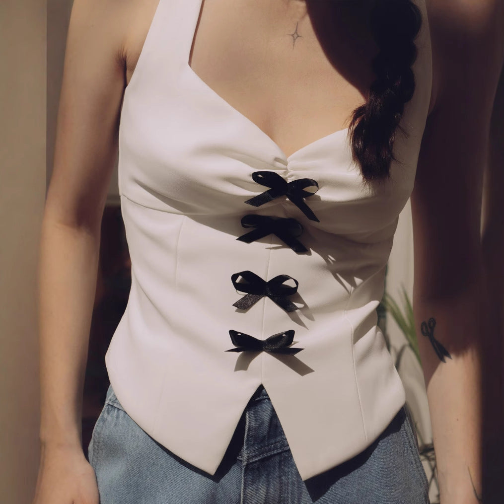 Women's sleeveless blouse shirt with decorative bow elements W&W