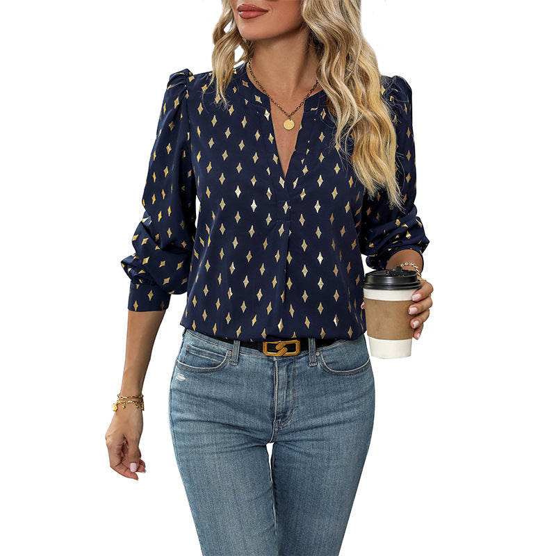 Women's blouse with elegant puff sleeves and graphic pattern WW