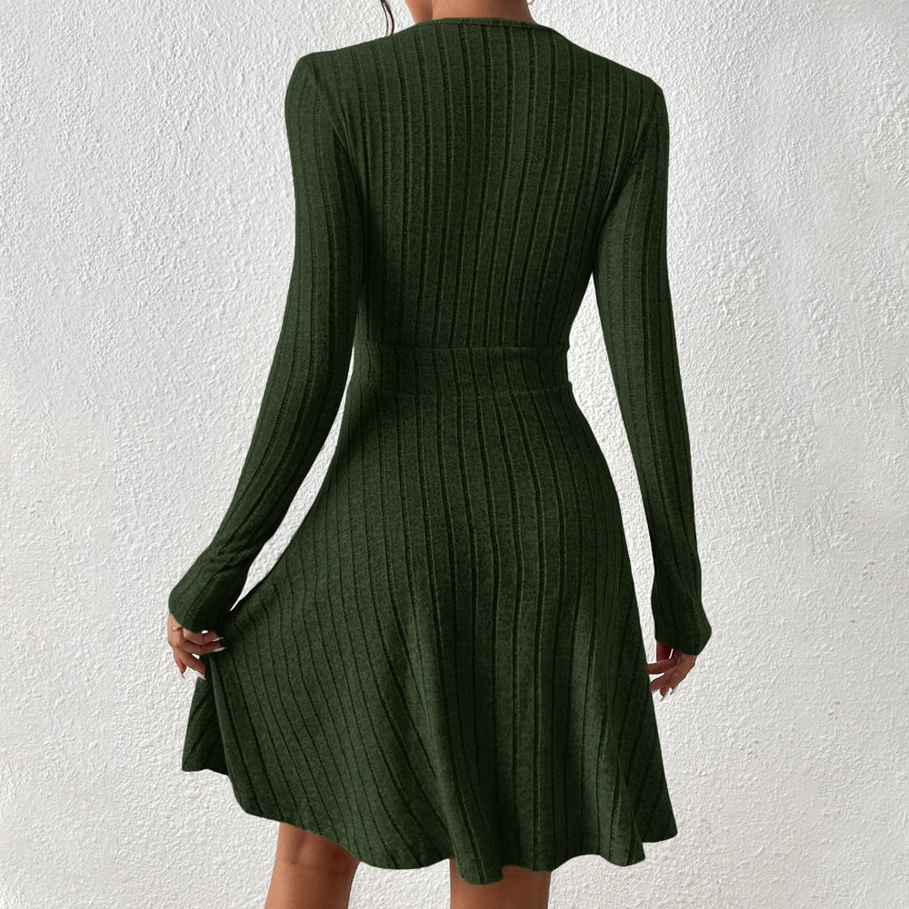 Women's knitted dress with deep V-neck and elegant long sleeves