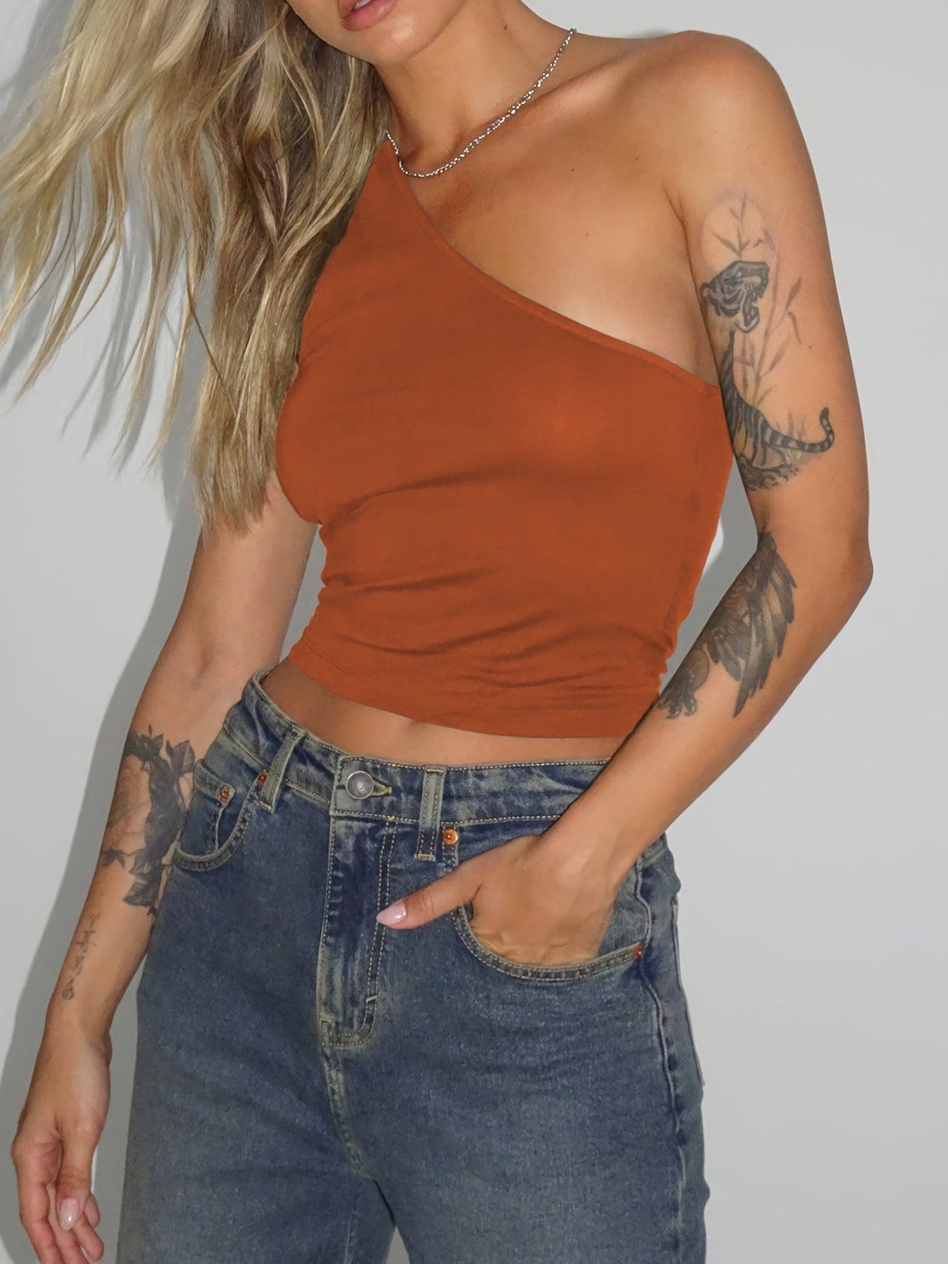 Women's asymmetric crop top made of stretch fabric with a slim fit WW