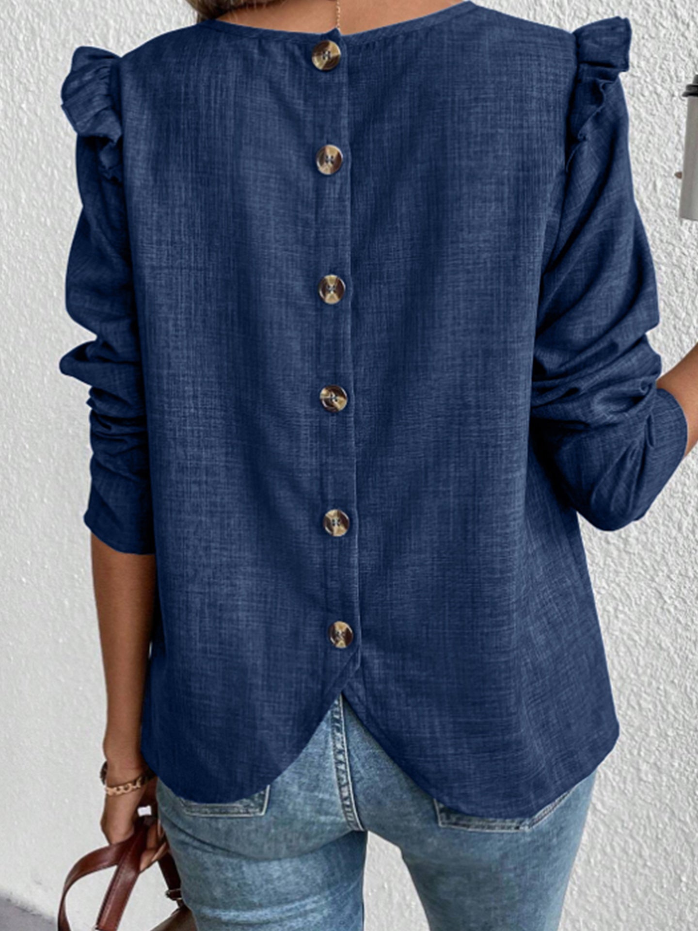 Women's blouse with decorative ruffled sleeves and elegant button placket WW