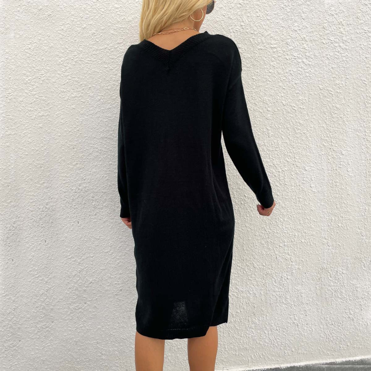 Women's knitted dress with open shoulders and an elegant, casual cut WW