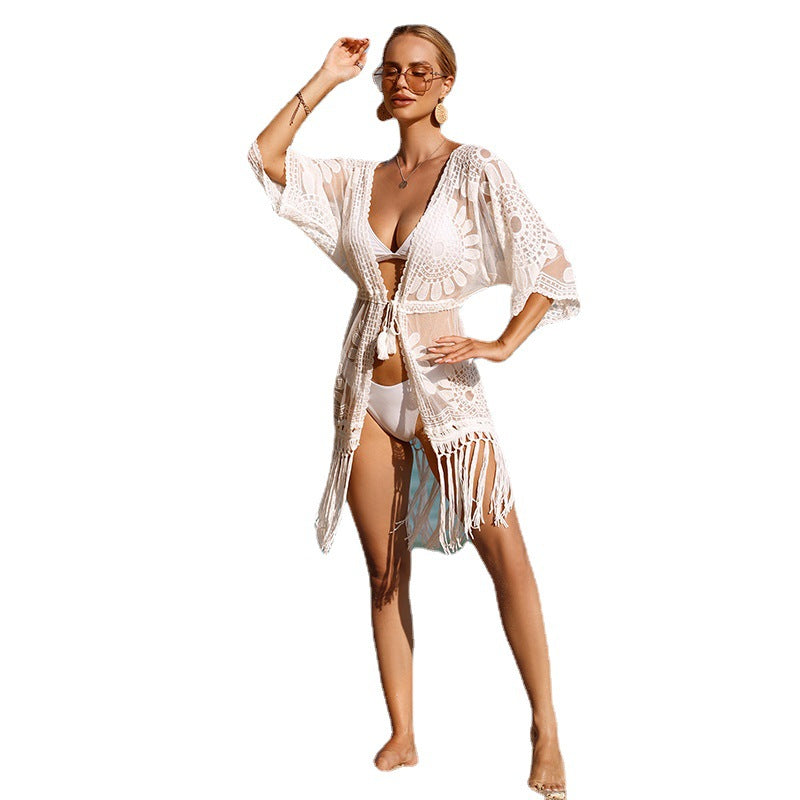 Women's airy beach cover-up with boho fringes and floral details