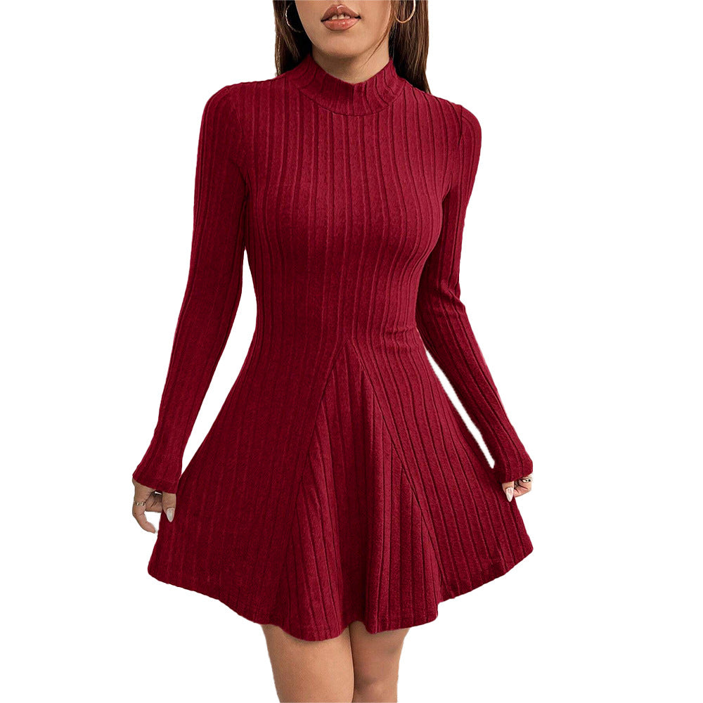 Women's knitted dress with high collar and flared hem