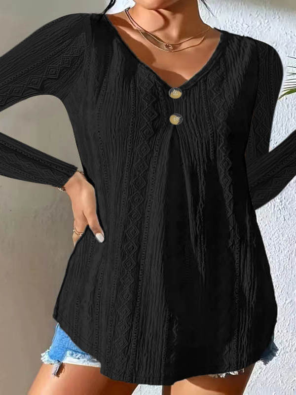 Women's blouse with decorative buttons and textured fabric WW