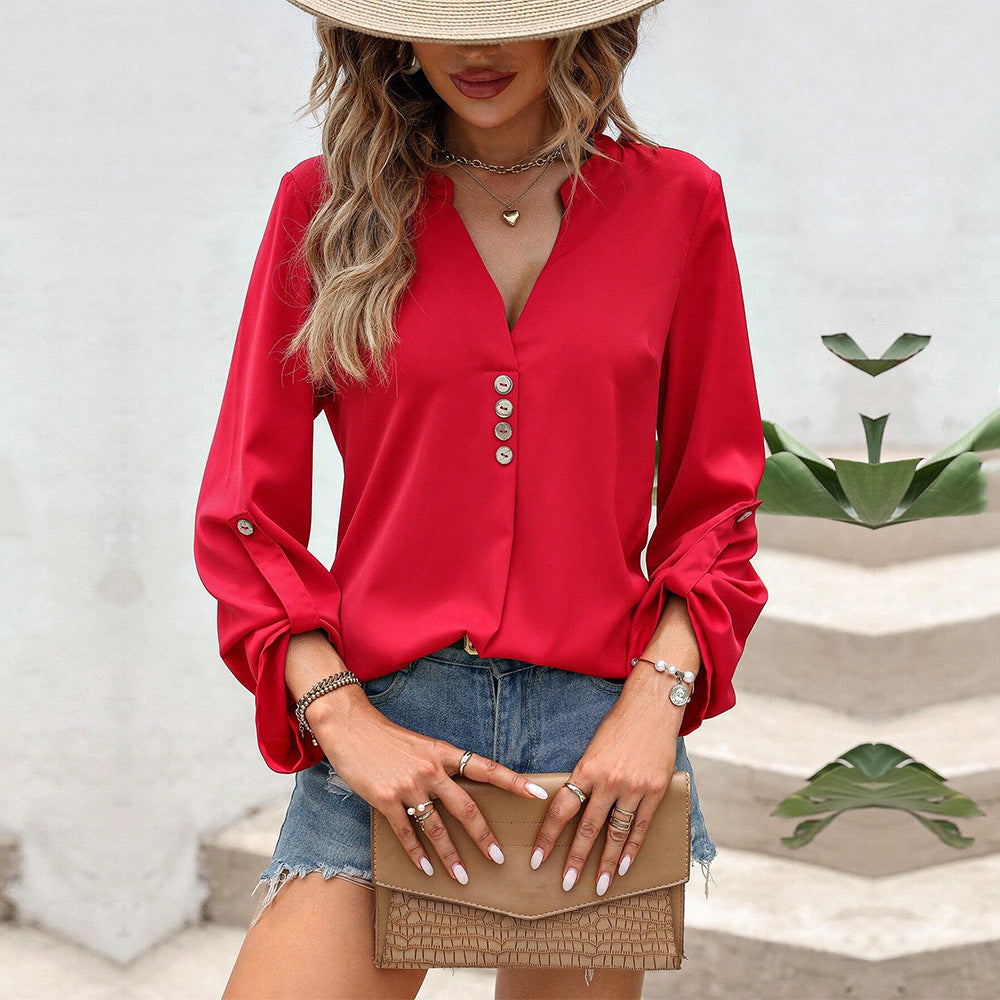 Women's blouse with elegant V-neck and sophisticated button details W&W