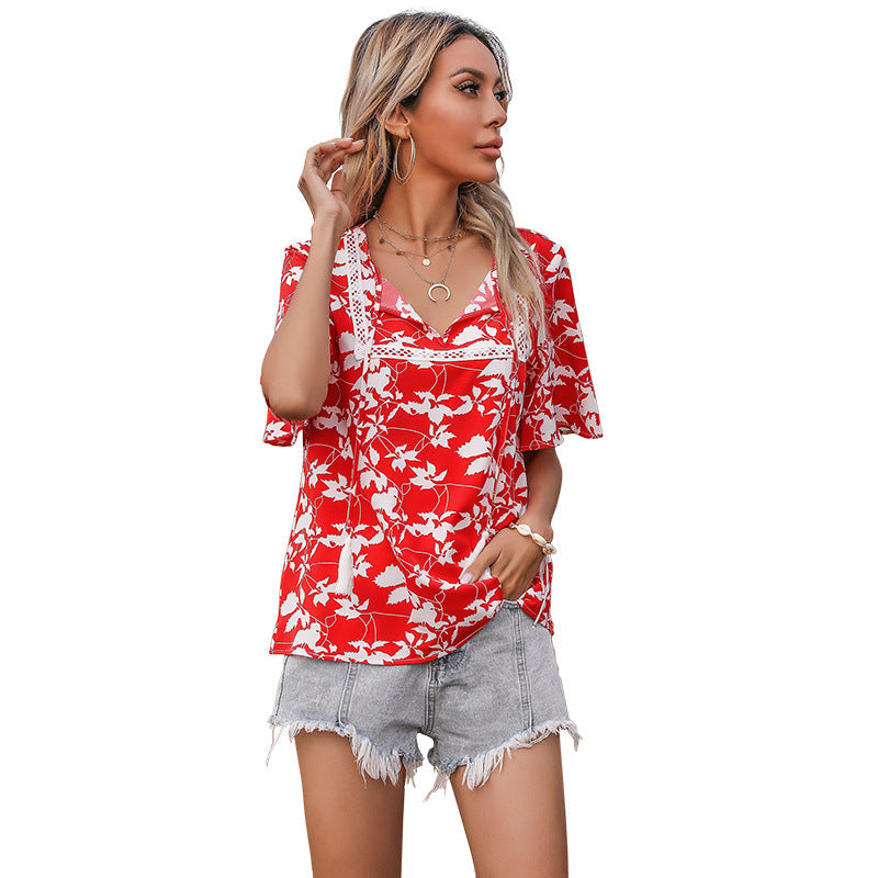 Women's floral design top with voluminous sleeves and elegant V-neck WW