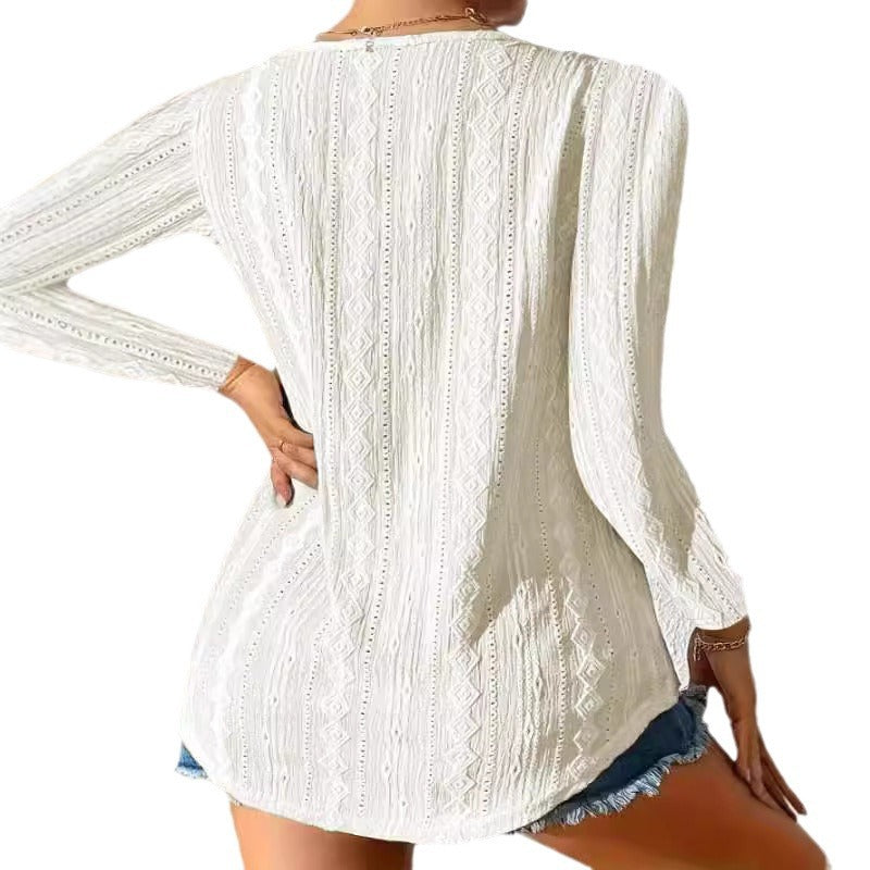 Women's blouse with decorative buttons and textured fabric WW