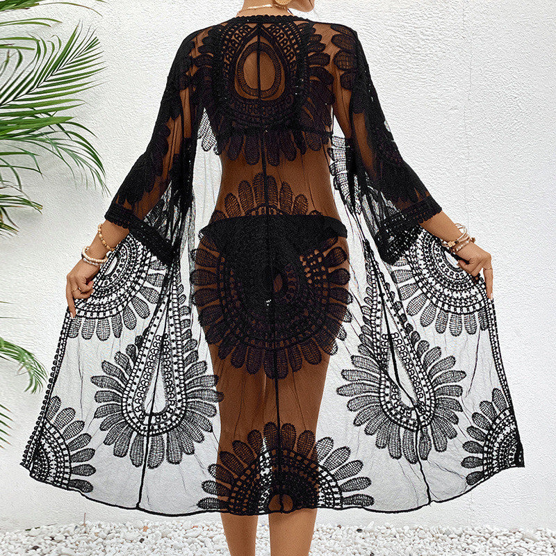 Women's chic crochet beach cover-up with voluminous sleeves and elegant design