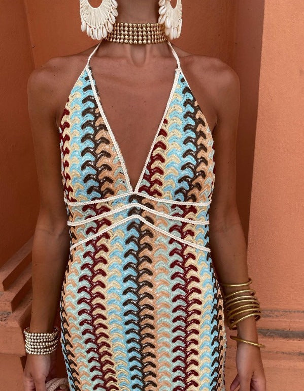 Women's knitted dress with deep V-neck and sophisticated wave pattern