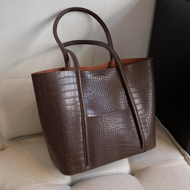 Betina | Vintage shoulder bag in brown leather with crocodile print