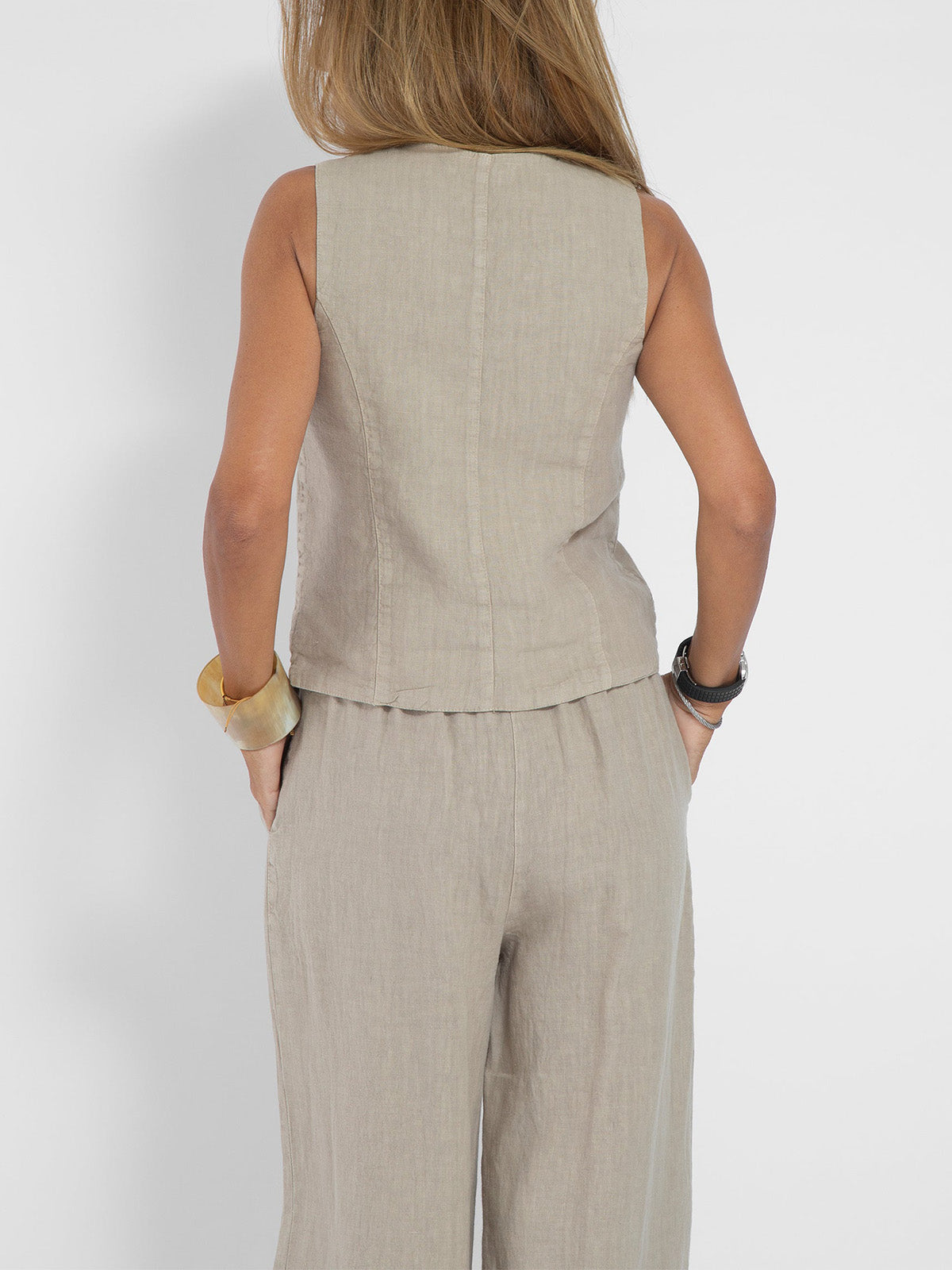 Elevate Your Style with the Aira Buttoned Vest and Wide-Leg Trousers Ensemble