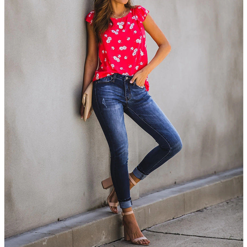 Women's floral top with playful ruffles and light fabric WW