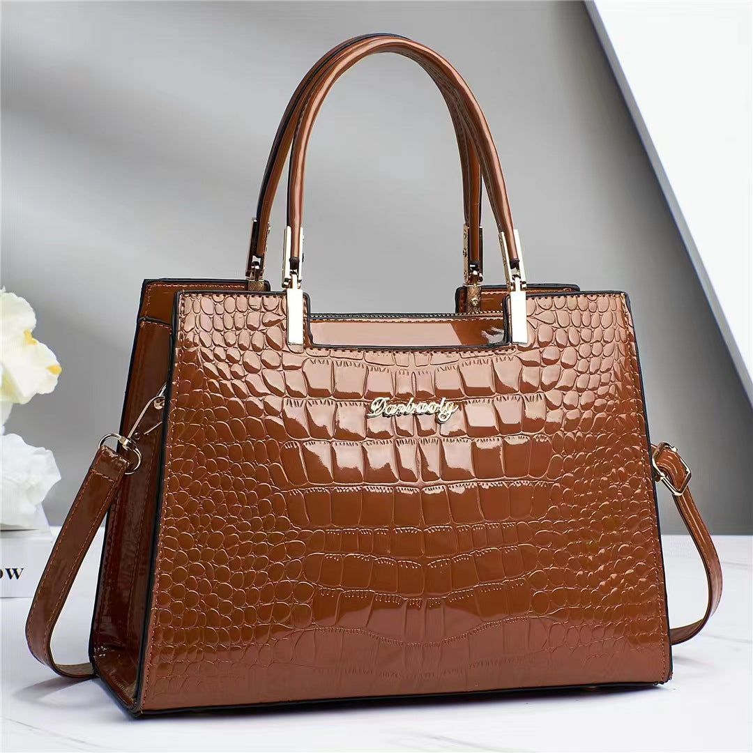 Wilja | Handbag in shiny leather with crocodile pattern