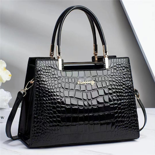 Wilja | Handbag in shiny leather with crocodile pattern