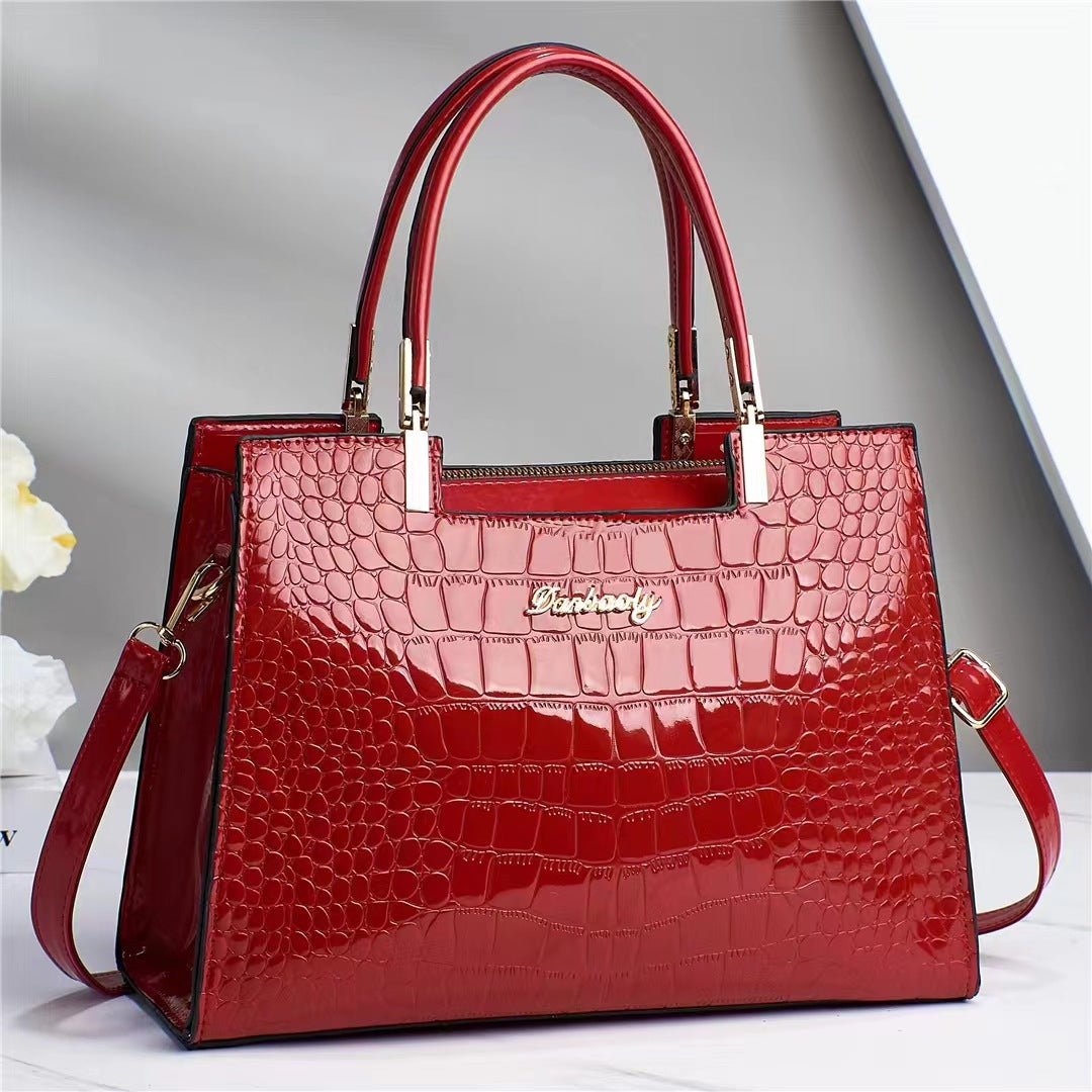 Wilja | Handbag in shiny leather with crocodile pattern