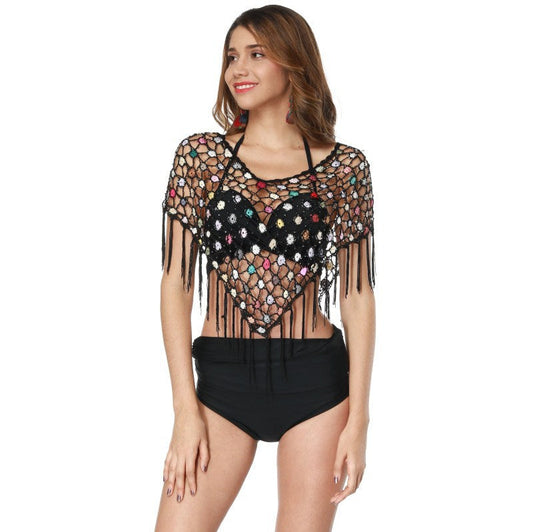 Women's crocheted beach poncho with colorful details and fringes