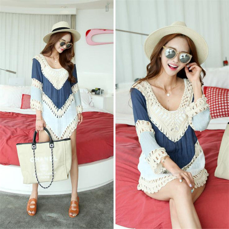 Women's beach cover-up with artistic crochet embellishments and frayed accents