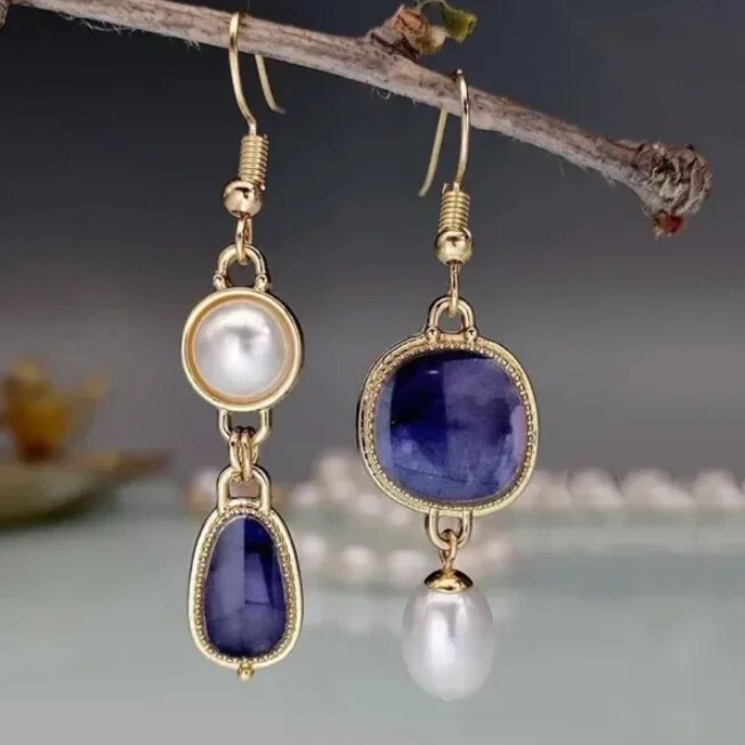 Vintage gold earrings with blue stones