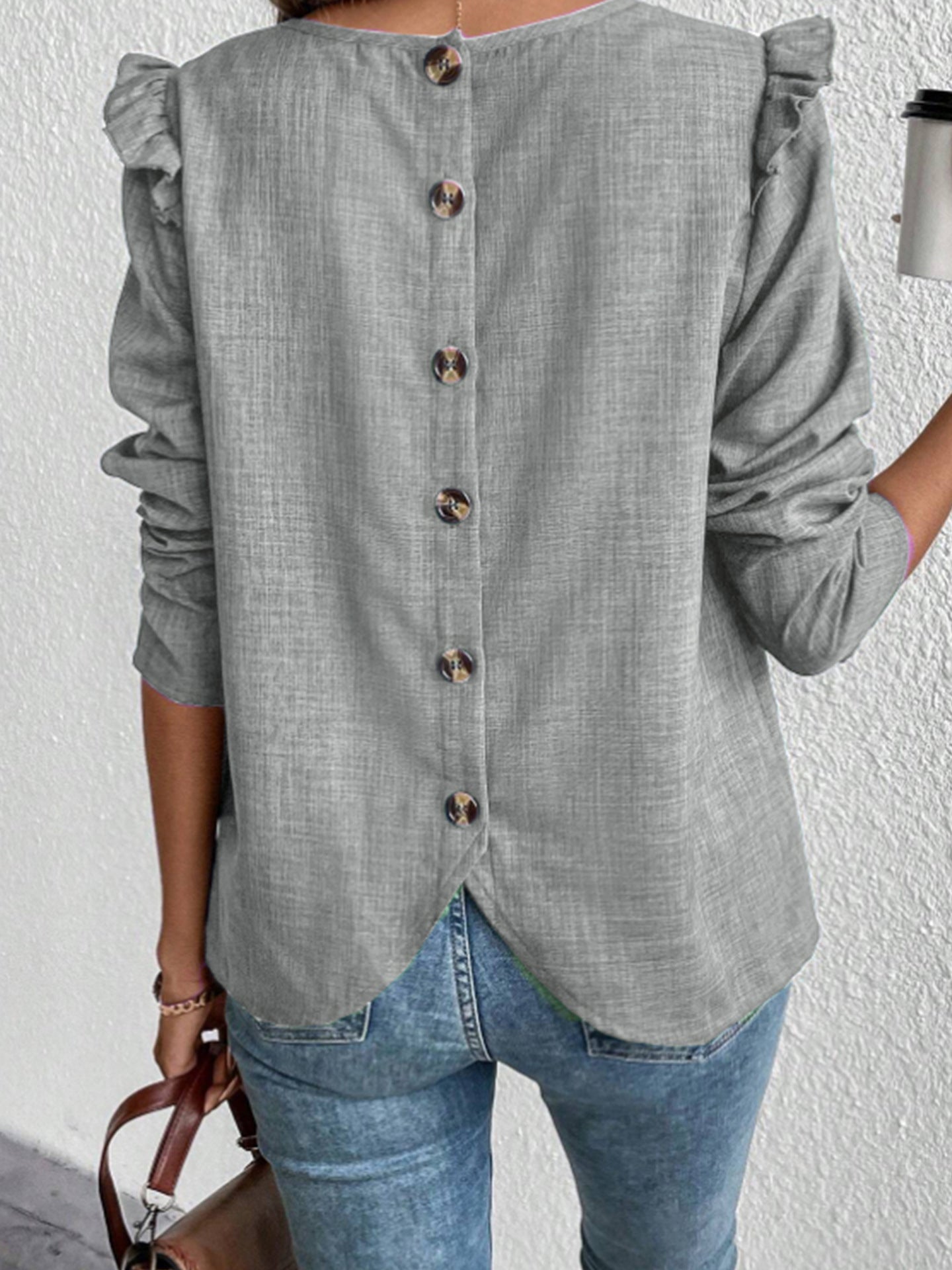 Women's blouse with decorative ruffled sleeves and elegant button placket WW