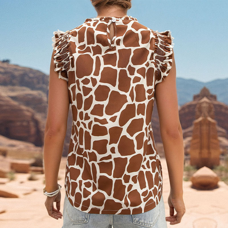 Women's sleeveless top with modern giraffe print and stylish ruffle details WW