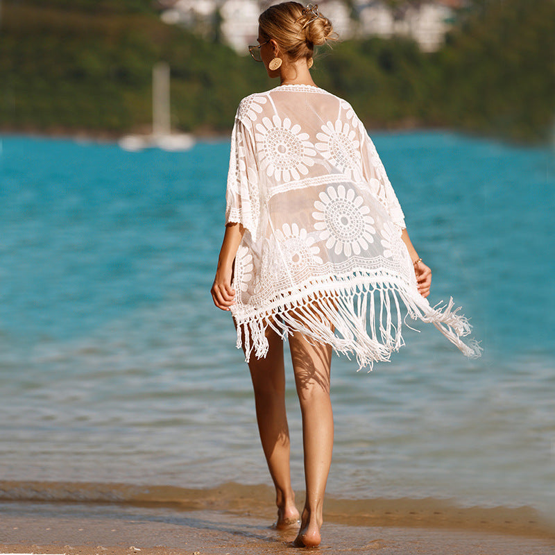 Women's airy beach cover-up with boho fringes and floral details