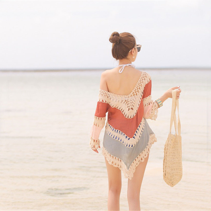Women's beach cover-up with artistic crochet embellishments and frayed accents