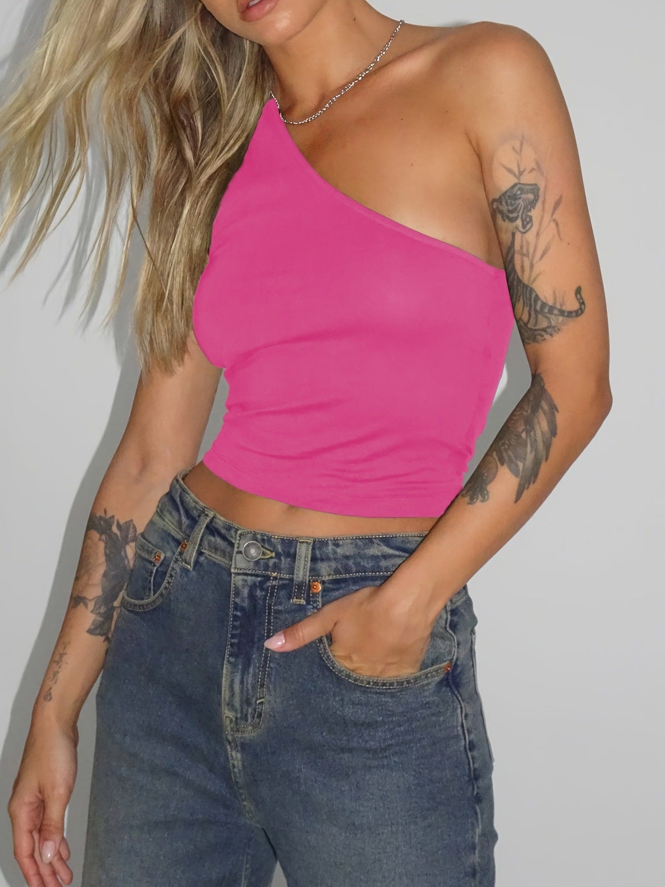 Women's asymmetric crop top made of stretch fabric with a slim fit WW