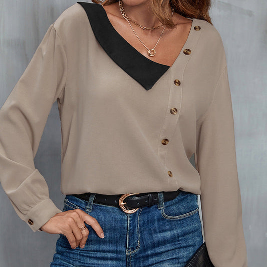 Women's blouse with asymmetric design and elegant button details WW