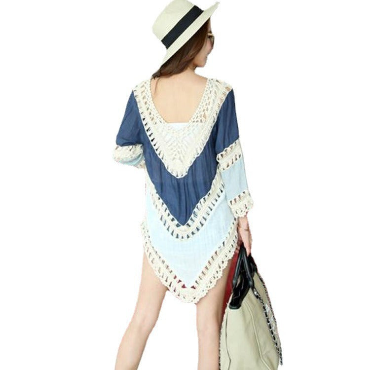 Women's beach cover-up with artistic crochet embellishments and frayed accents