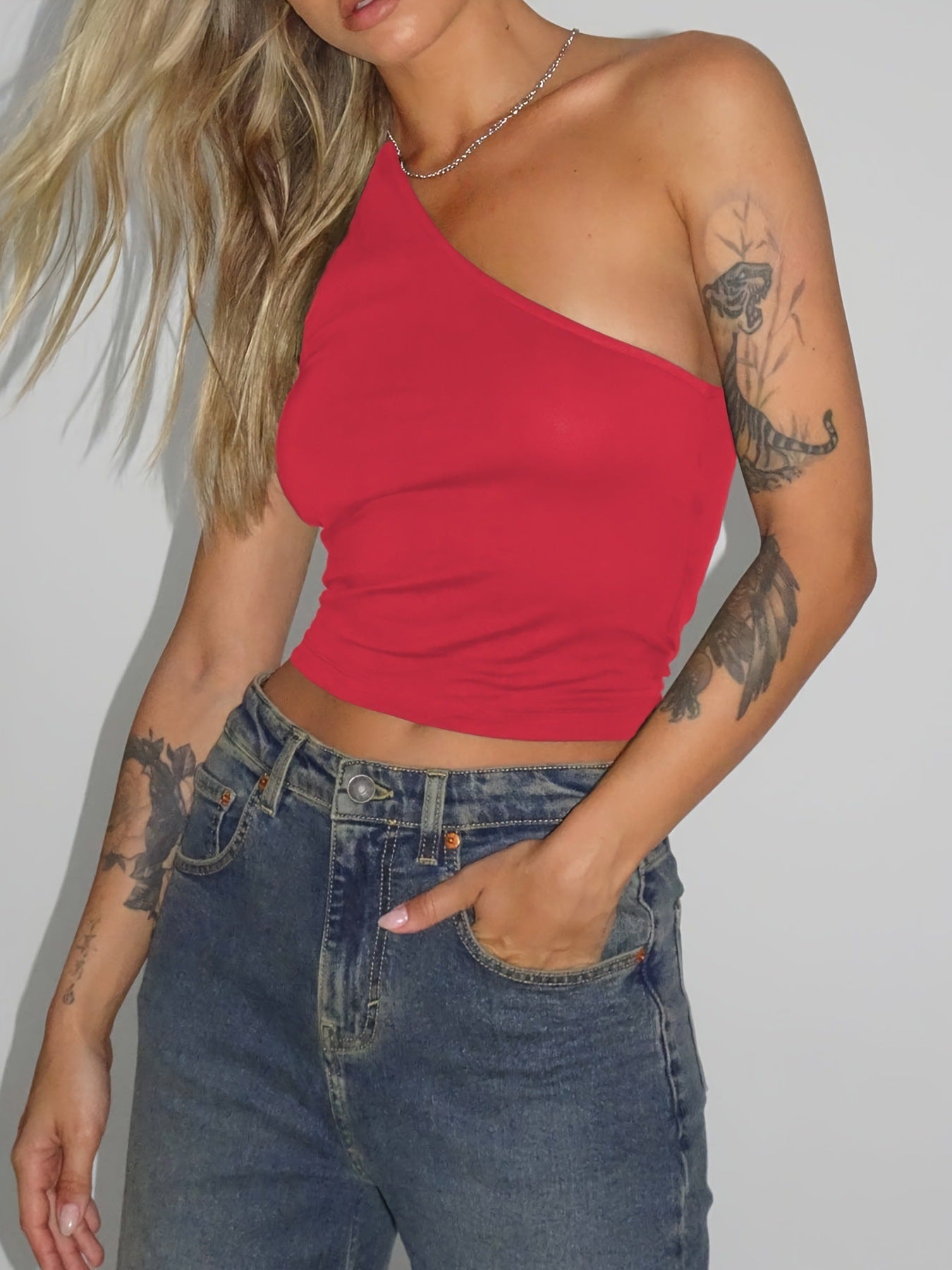 Women's asymmetric crop top made of stretch fabric with a slim fit WW